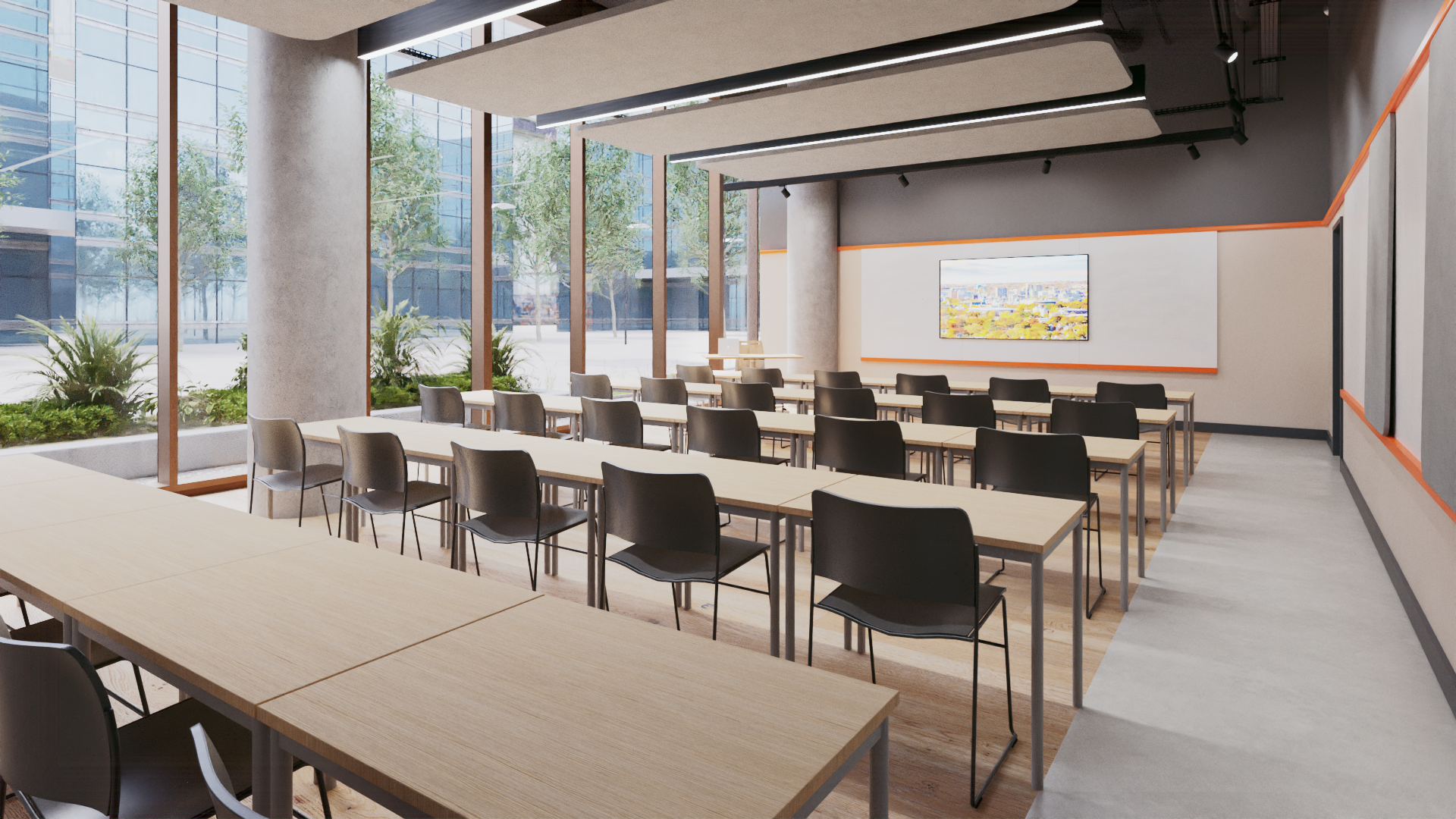 Classroom at the University of New Haven – Riyadh, with a teaching wall, natural light from floor-to-ceiling windows and flexible seating
