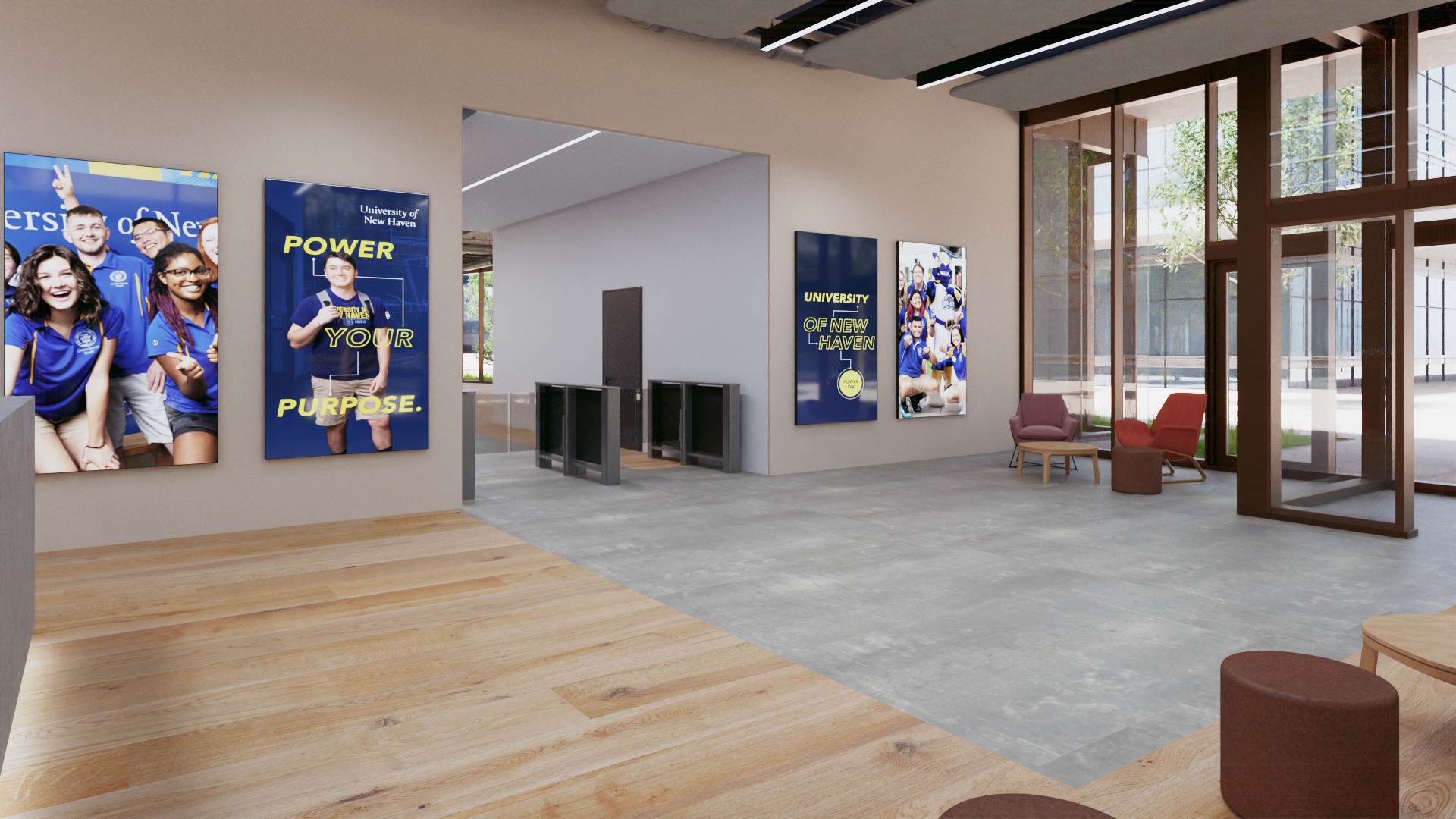 Entrance corridor with floor-to-ceiling glazing, student life displays and a view through to the central courtyard