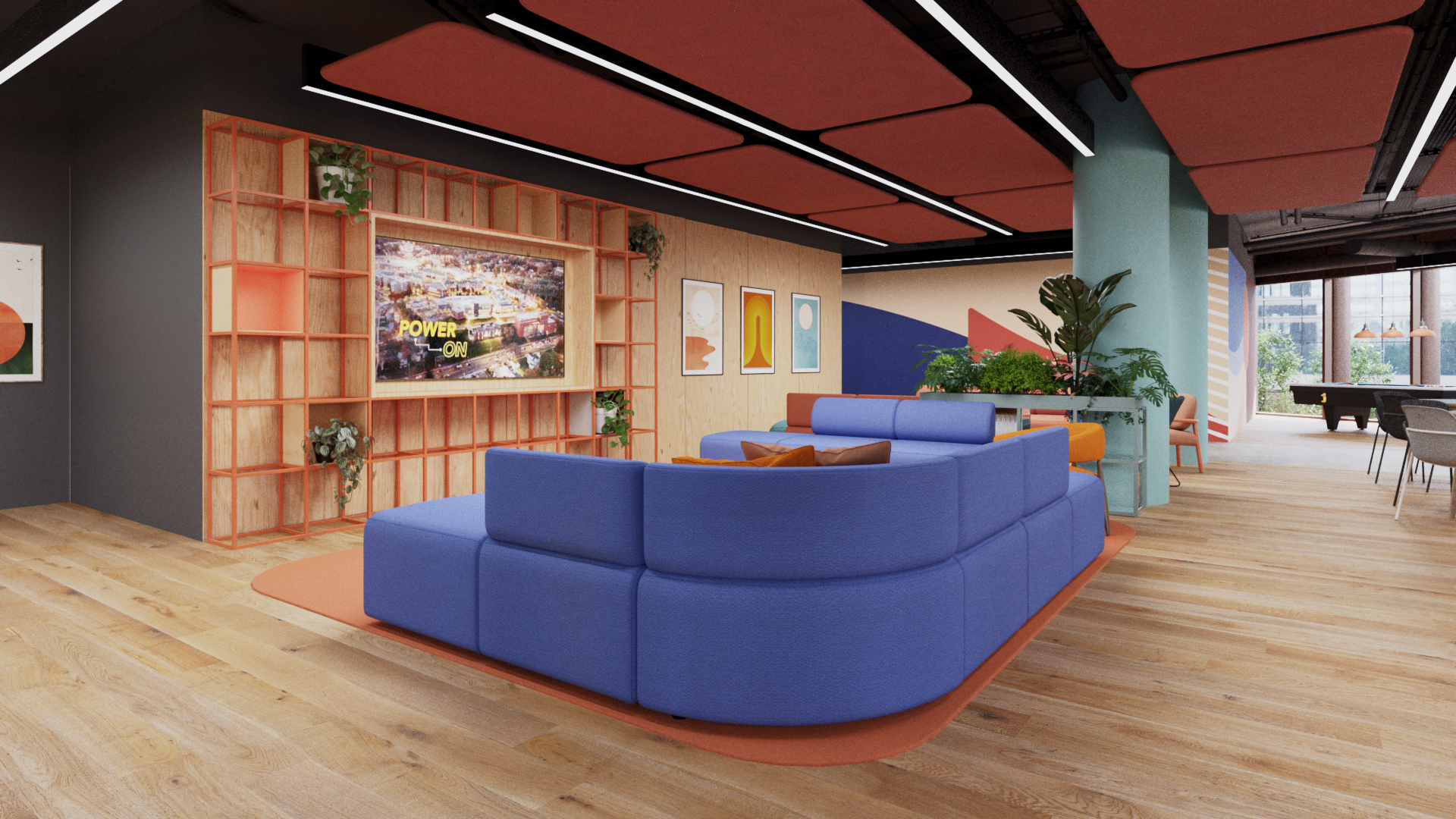 Student commons at the University of New Haven – Riyadh, with colorful seating, booth nooks, bookshelves and natural light