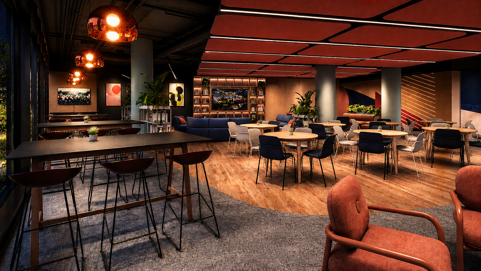 Lounge area with modular sofas, a large display screen and colorful artwork